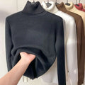 Black fleece turtle neck sweater with ribbed collar and long sleeves made of soft knit fabric for winter pullover use
