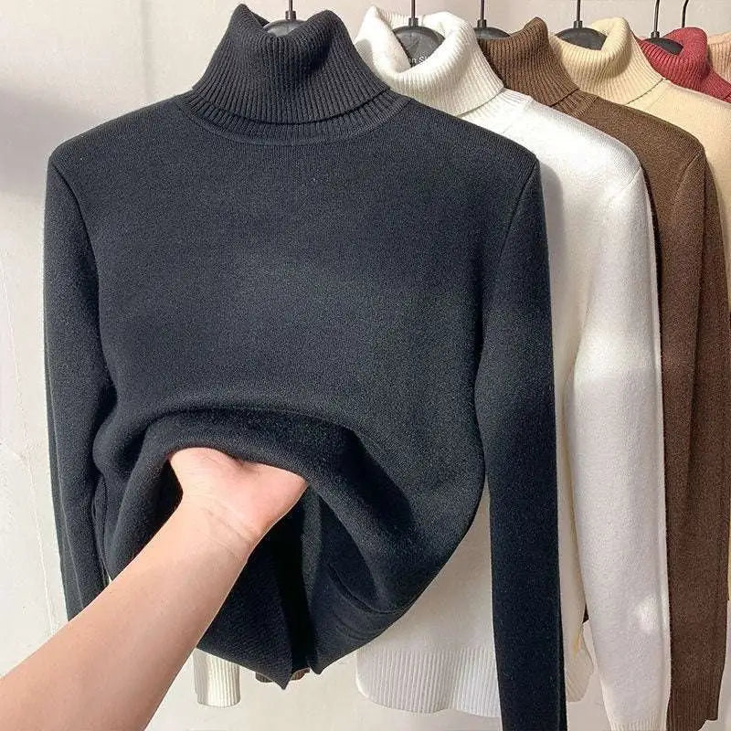 Black fleece turtle neck sweater with ribbed collar and long sleeves made of soft knit fabric for winter pullover use
