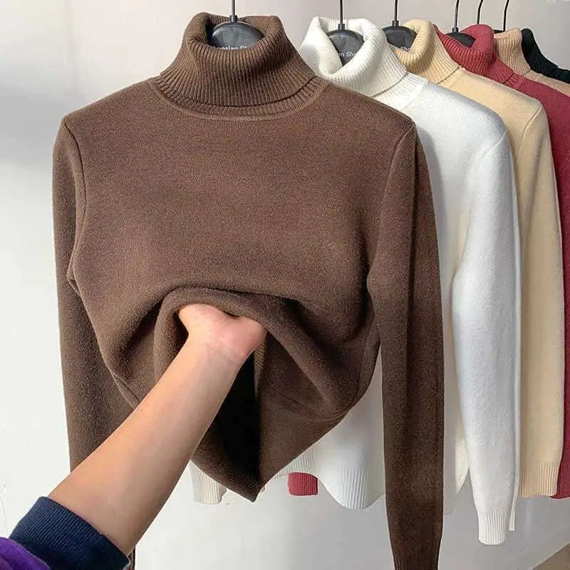 Beige fleece turtle neck sweater with ribbed collar and cuffs made of soft knit fabric for winter pullover use