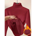 A plush deep red fleece turtle neck sweater with a soft fleece-lined interior perfect as a neck sweater winter pullover