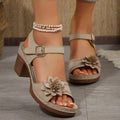 Beige floral flowers chunky heel sandals with floral embellishments, textured sole, and adjustable ankle strap