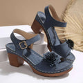 Beige floral flowers chunky heel sandals with blue suede straps, floral embellishment, and wooden block heels