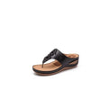 Black leather massage sandals with floral embellishments and cushioned wedge sole in beige floral large size design