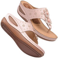 Beige floral large massage sandals with pink leather thong design, floral embellishments, and cushioned sole