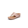 Pink leather massage sandals with floral embellishments and perforated detailing in beige floral large style