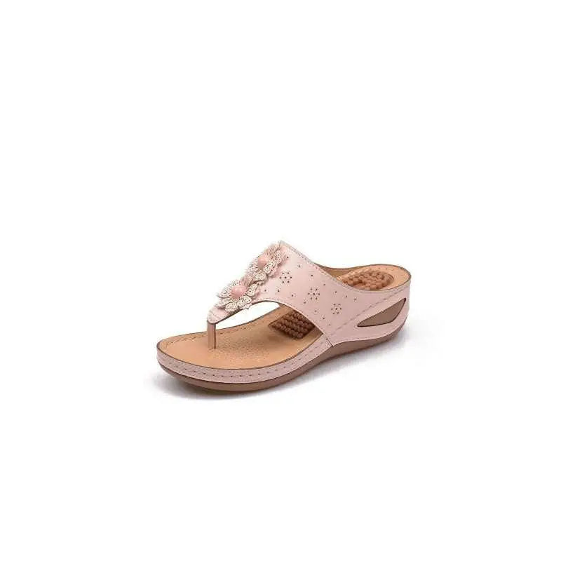 Pink leather massage sandals with floral embellishments and perforated detailing in beige floral large style