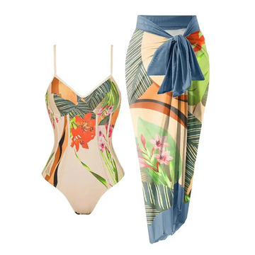 Beige floral one piece swimsuit with vibrant tropical print and matching sarong bathing wrap with blue tie belt