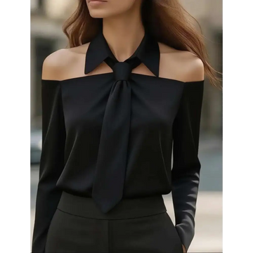 Black satin off-the-shoulder blouse with strap lapel design and prominent tied bow at the neckline