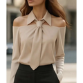 Beige off-the-shoulder blouse with halter neck strap and strap lapel design featuring a structured collar and tied bow