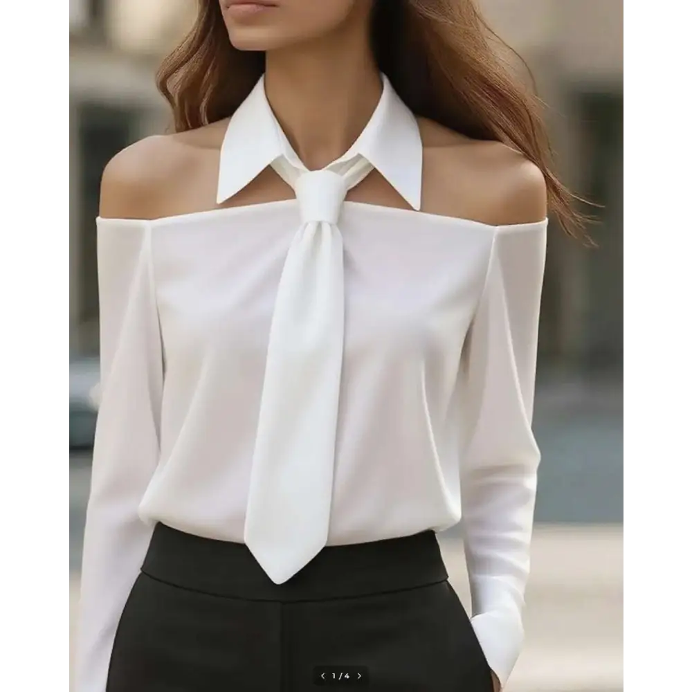 White off-the-shoulder blouse with collar and tie-front detail featuring a beige halter neck strap lapel design