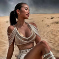 Beige macramé crop top with intricate woven straps and deep v-neckline in creative beach travel tassel dress set
