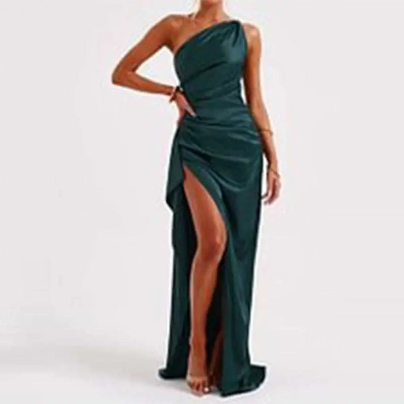 Beige one-shoulder backless slit satin gown with draped bodice and high slit in emerald green satin fabric