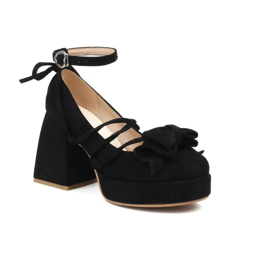 Beige suede platform lolita heels with chunky heel ankle strap and decorative bow on the toe in small size