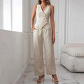 Beige sleeveless pleated casual vest with button closure and matching wide-leg vest suit trousers
