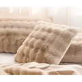 Beige rabbit velvet blanket with thickened faux fur throw texture on a cushioned seat for cozy comfort