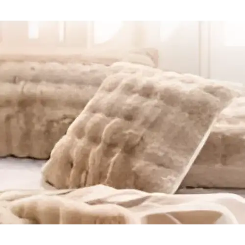 Beige rabbit velvet blanket with thickened faux fur throw and a plush textured cushioned seat in beige
