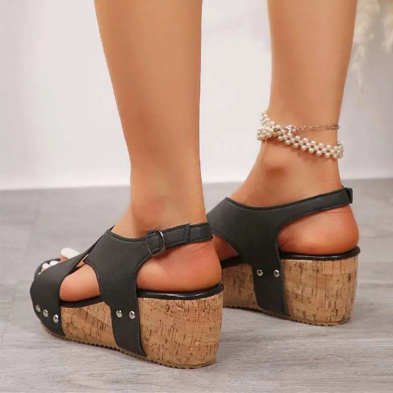 Black leather rivet wedges snadals with cork sole and silver studs for stylish fish mouth shoes look