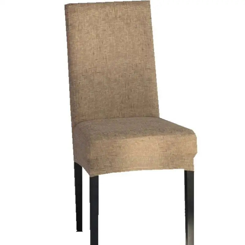Beige textured universal chair cover on a chair with black metal legs showing a soft fabric texture