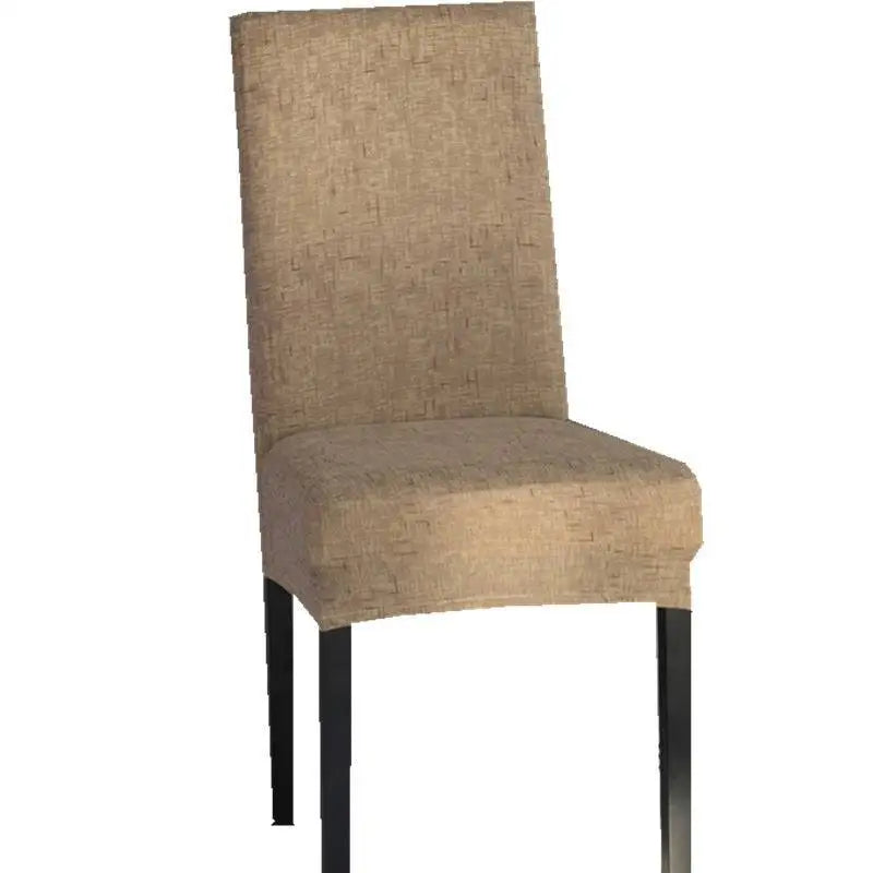 Beige textured universal chair cover on a chair with black metal legs showing fabric texture and fit
