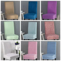 A beige textured universal chair cover among stretchy multicolor textured universal chair covers with black metal legs