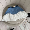 Beige two tone waist tiered skirt in denim and white with ruffled high waist and black belt with gold-tone buckle