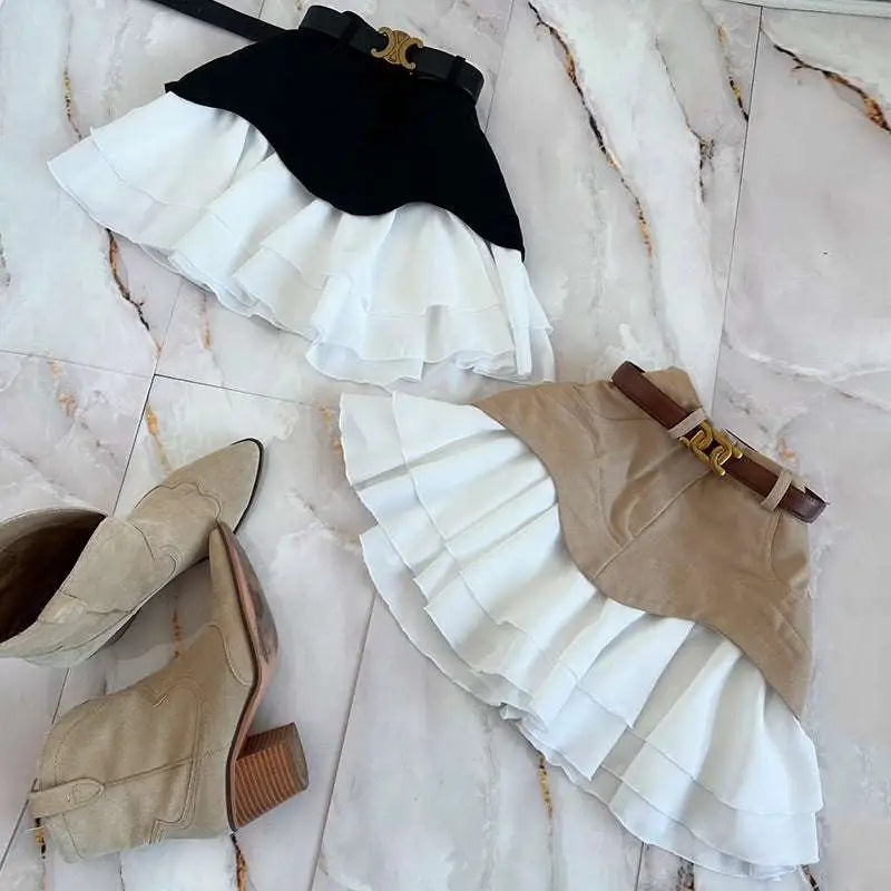 Beige two tone waist tiered skirt with structured suede-like top and flowing layered ruffled high waist hem