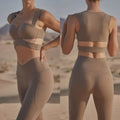 Beige yoga pants and sport coat fitness set featuring a supportive bra top with wide straps and high-waisted leggings
