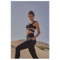 Black athletic two-piece set with sleek cut-out design complementing beige yoga pants and sport coat fitness set