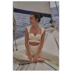Beige yoga pants and cream-colored form-fitting sport coat fitness set with sweetheart neckline and cut-out details