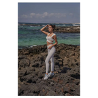 White athletic two-piece set with cut-out design and seamless leggings paired with beige yoga pants and sport coat fitness set
