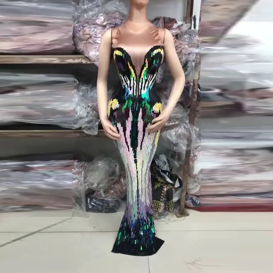 A dazzling rainbow gradient sequin evening dress female singer costume featuring a floor-length gown adorned with iridescent sequins.