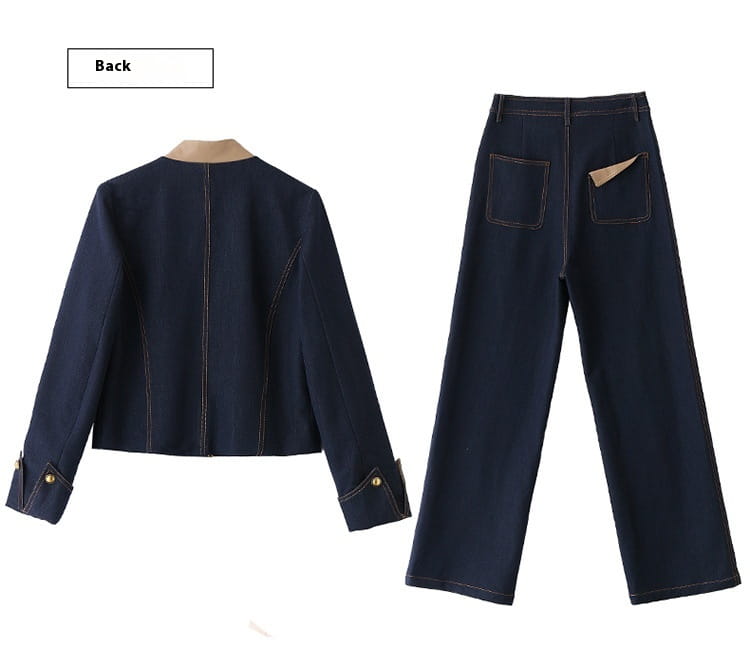 dark blue denim two-piece set featuring a cropped casual denim jacket with gold-tone button cuffs and wide-leg pants with contrasting tan stitching in an elegance retro casual style