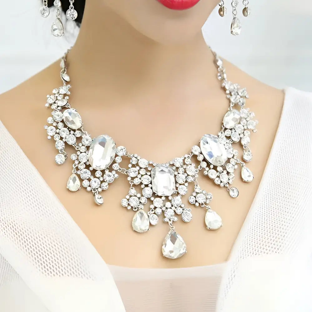 A dazzling silver-toned big crystal bridal rhinestone necklace and earring set with cascading clear crystals