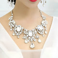 Big crystal bridal silver choker necklace with large oval and teardrop clear crystals and pave-set bridal rhinestone accents