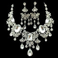 A dazzling silver-toned big crystal bridal rhinestone necklace and earring set with cascading clear crystals