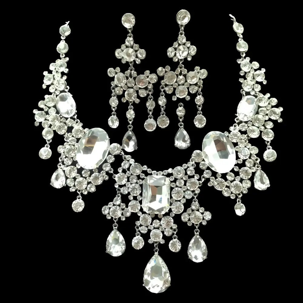 A big crystal bridal silver choker necklace and matching earrings with cascading teardrop and oval-cut rhinestones