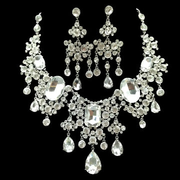 A big crystal bridal silver choker necklace and matching earrings with cascading teardrop and oval-cut rhinestones