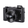Black 5k digital camera with textured grip and 3x optical zoom lens from royale essence lux