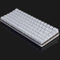A sleek white mechanical keyboard with a silver metallic frame contrasting the black ak33rgb mechanical rgb version black