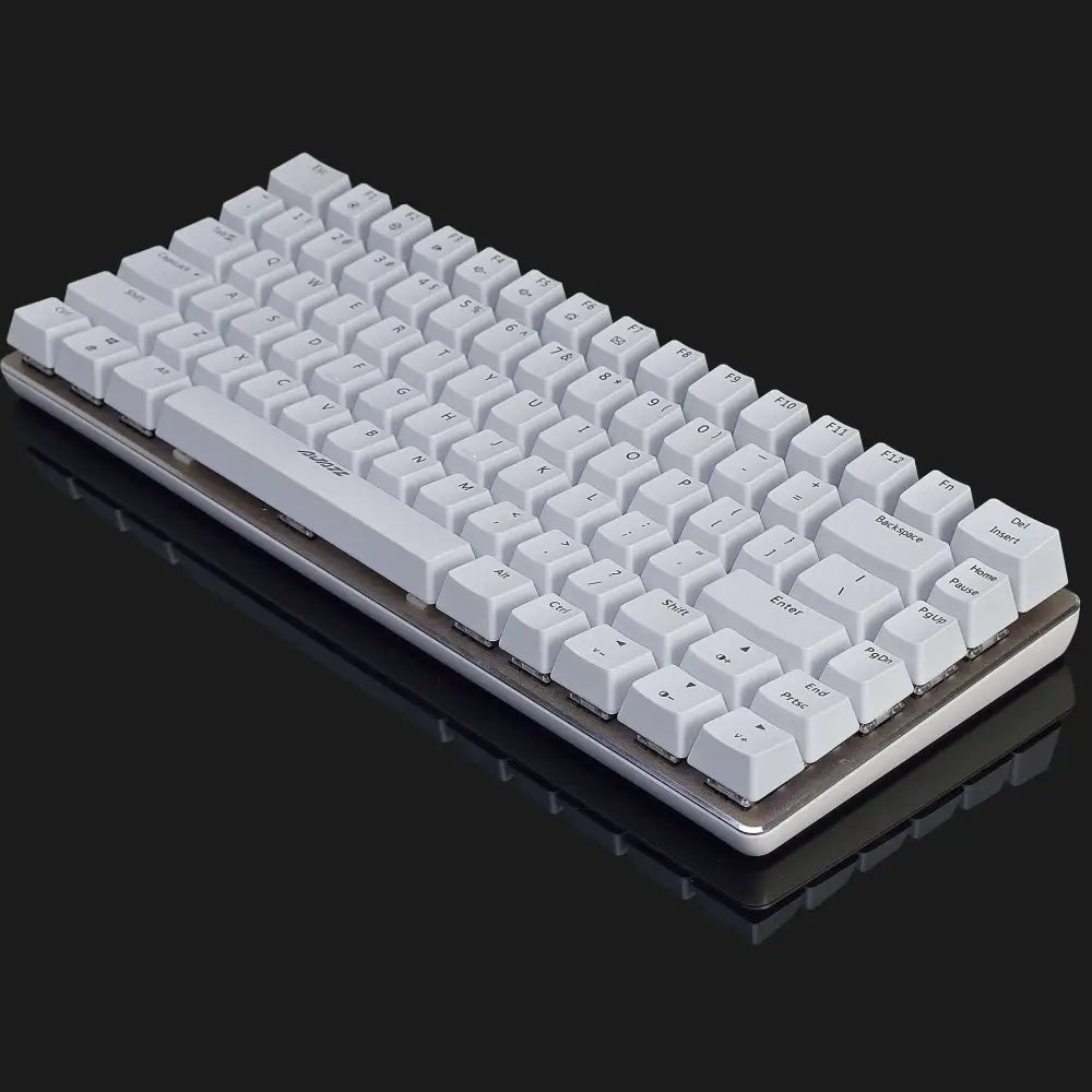 A sleek white mechanical keyboard with a silver metallic frame contrasting the black ak33rgb mechanical rgb version black