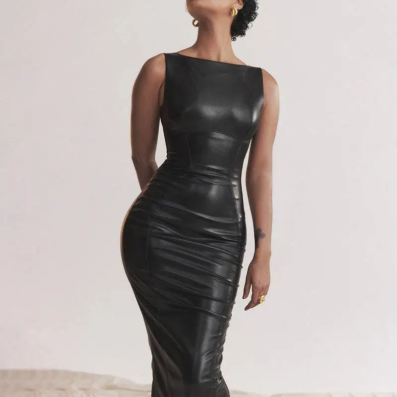 A sleek black american style women dress with ruched detailing in glossy faux leather skirt and structured bodice