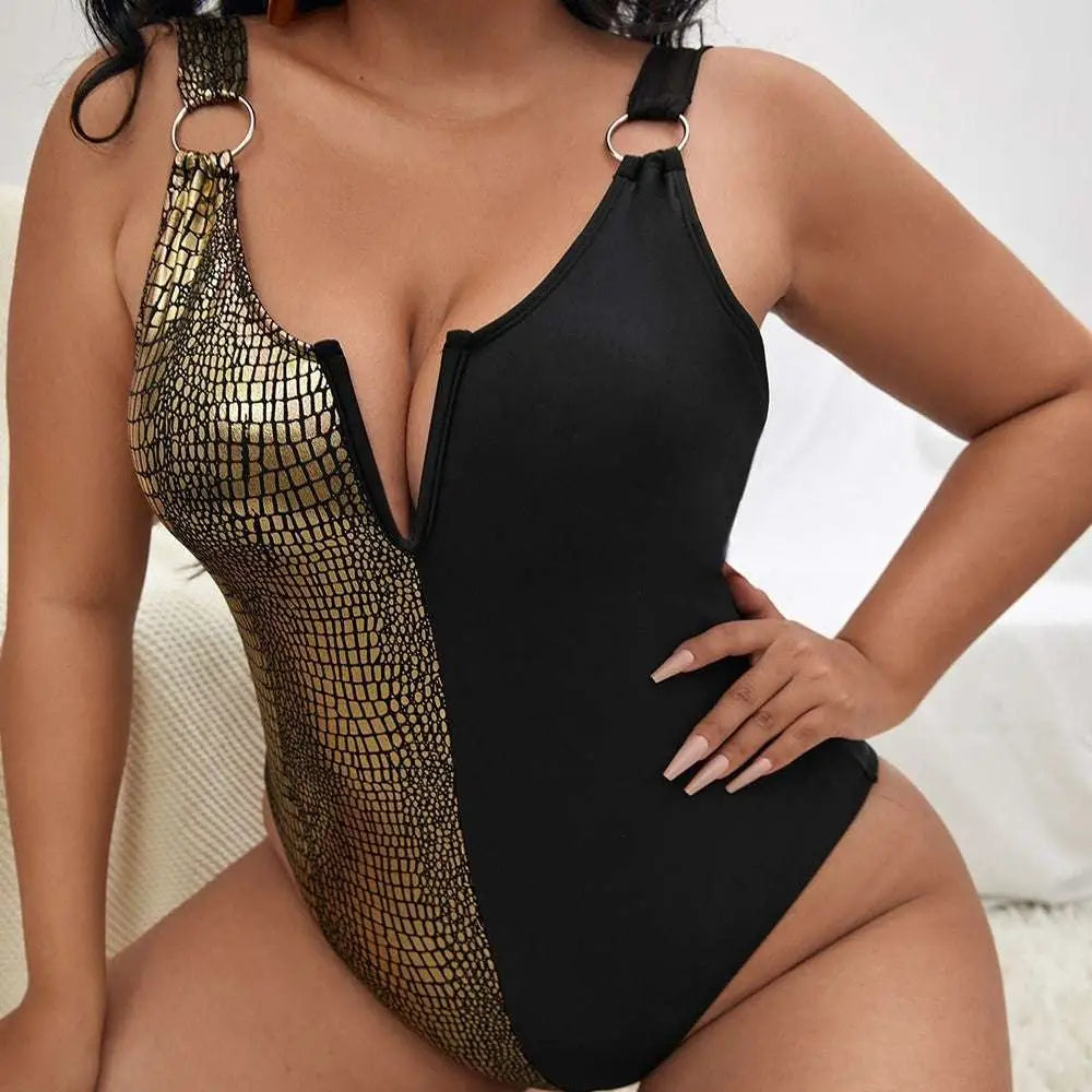 Black and gold mesh american plus size one-piece swimsuit with metallic ring straps and a plunging neckline