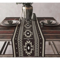 Black and white aztec table runner 13x90in with bold geometric star-like motifs in a symmetrical design