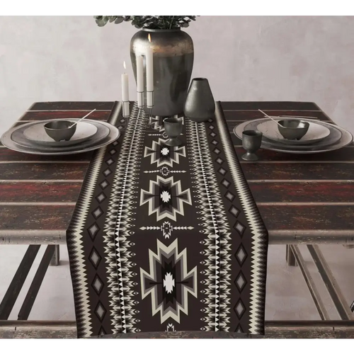 Black and white aztec table runner 13x90in with bold geometric star-like motifs in a symmetrical design