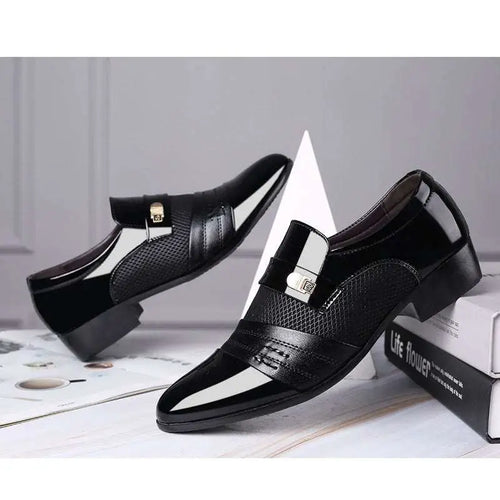 Black and white mesh patent leather shoes featuring black and white patent leather with gold-tone buckle accents