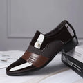 Black and brown patent leather shoes featuring white mesh patent panel, stripe accent, and silver buckle detail