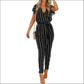 Black and white striped jumpsuit with vertical striped pattern, short flutter sleeves, self-tie waist, and backless design