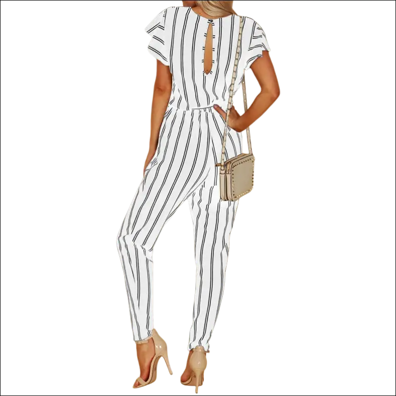Black and white striped jumpsuit with flutter sleeves and backless design featuring a tie detail and vertical striped pattern
