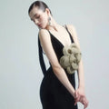 Black camisole backless slim velvet floral gown with textured gold floral embellishment on shoulder