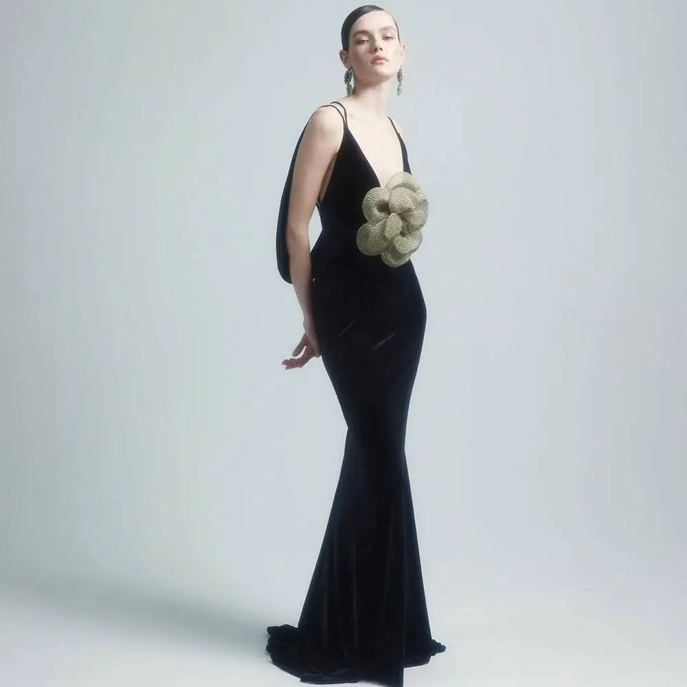 Black camisole backless slim fit velvet floral gown in black with beige floral embellishment at the waist